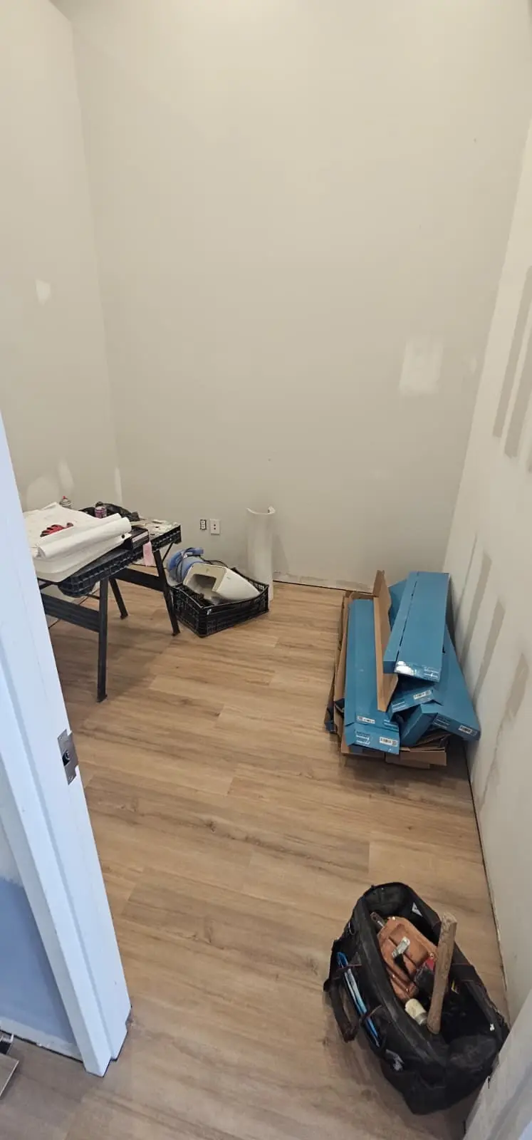 Bedroom with new luxury vinyl plank flooring installed