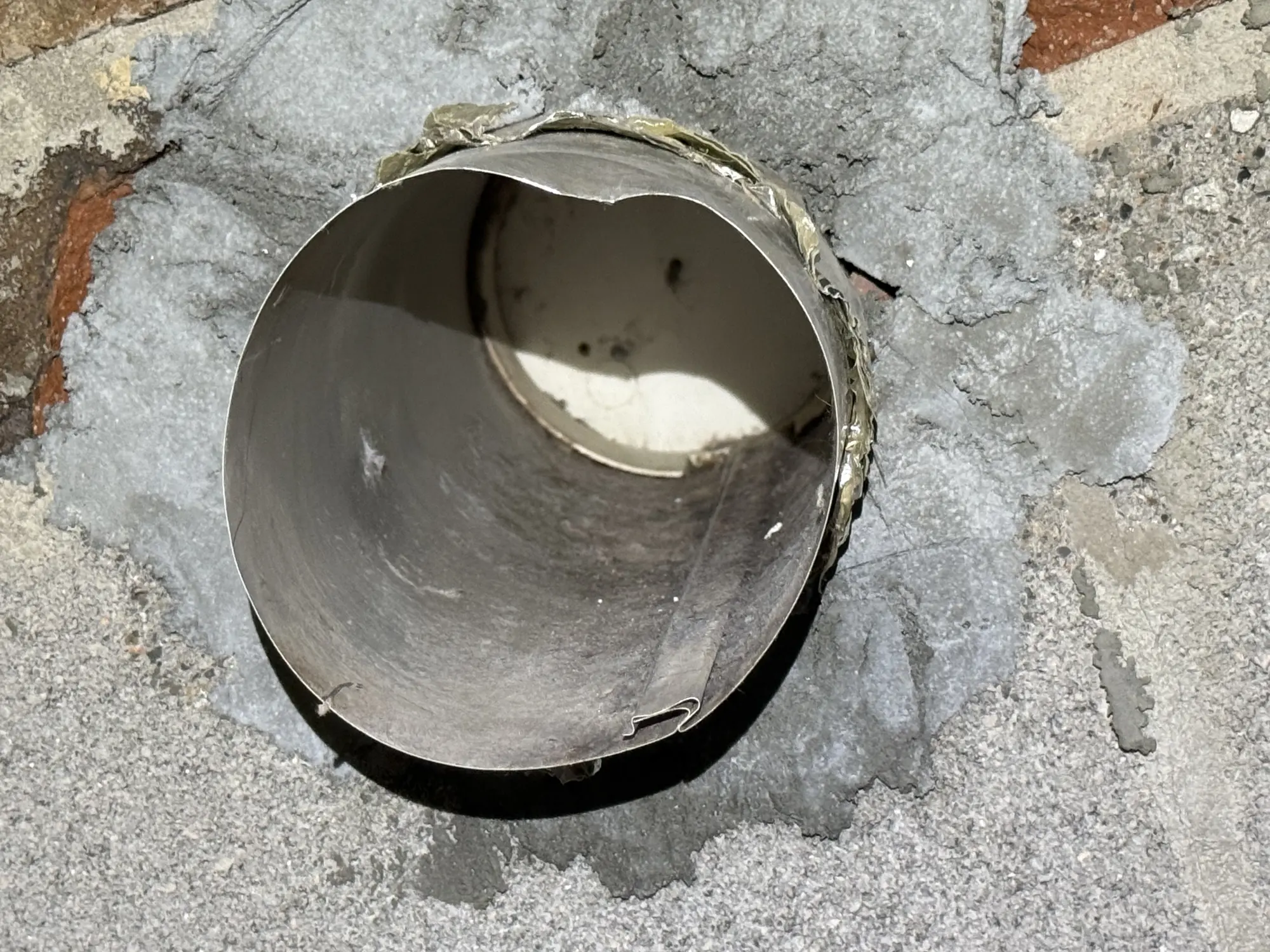 Exterior dryer vent duct cleared and reset