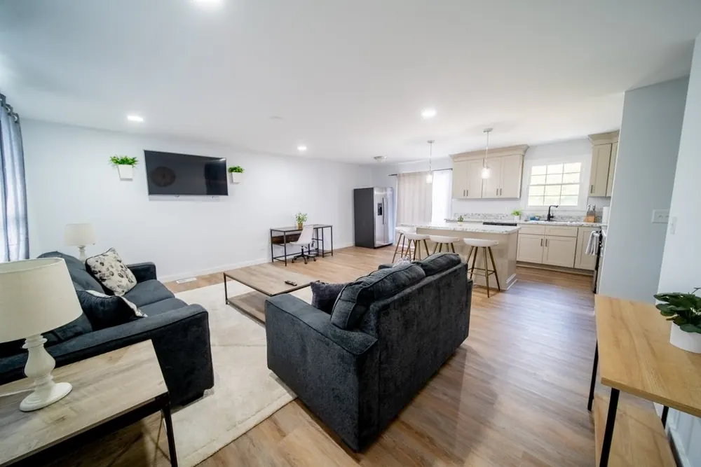 Finished open plan living room and kitchen in a fully remodelled house