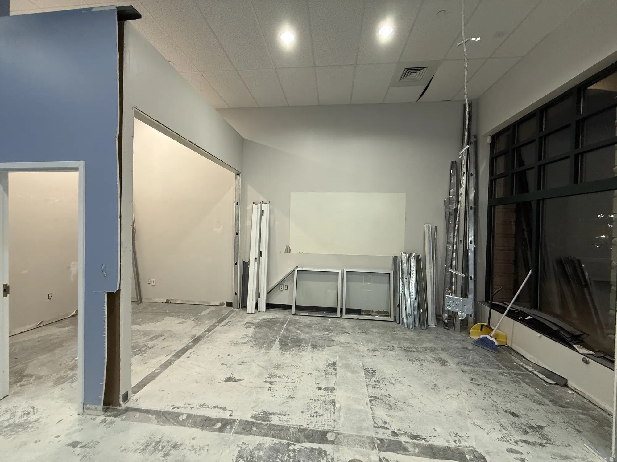 Commercial office space with old flooring removed down to concrete